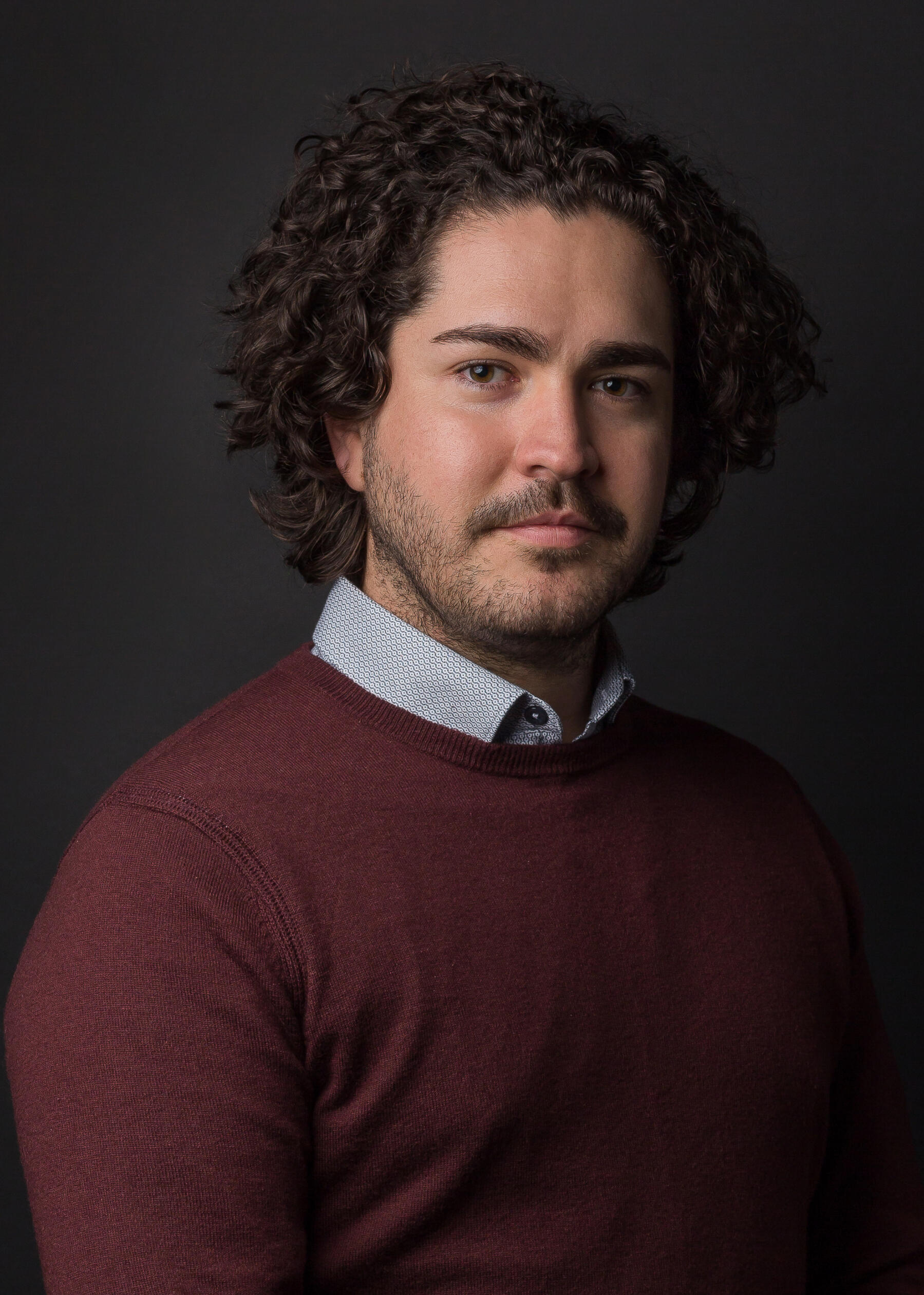 Profile photo of Michael in casual business attire.