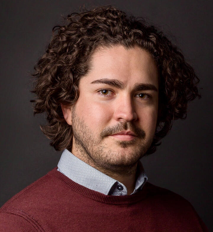 Profile photo of Michael in casual business attire.